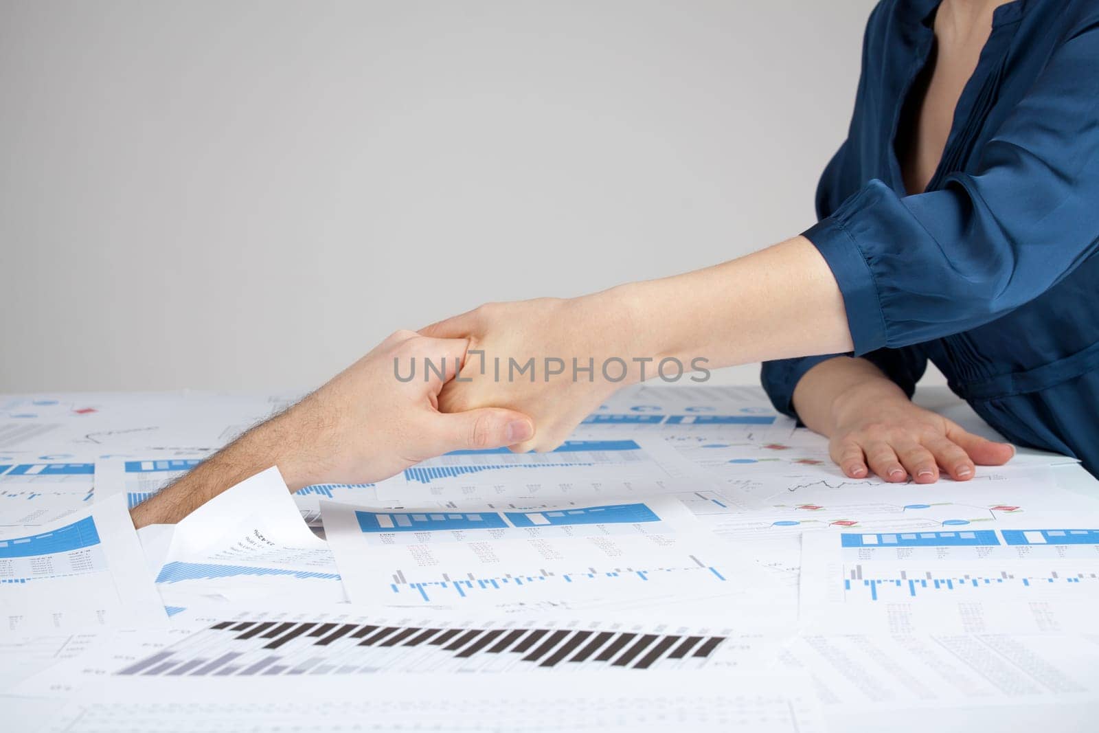 Helping hand against bureaucracy (rescue of paperwork) for manager by administrative worker.