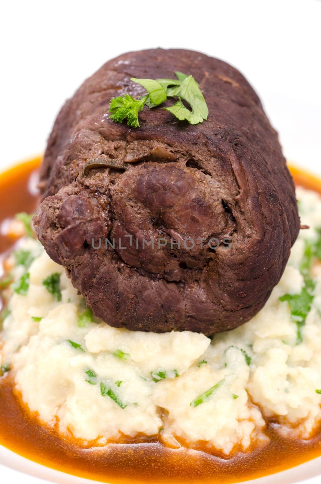 Braised beef roulade on celery puree