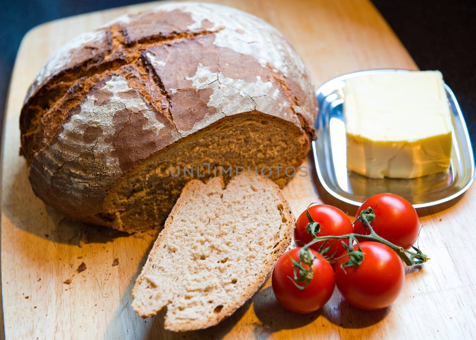 fresh farmhouse bread with butter and tomato