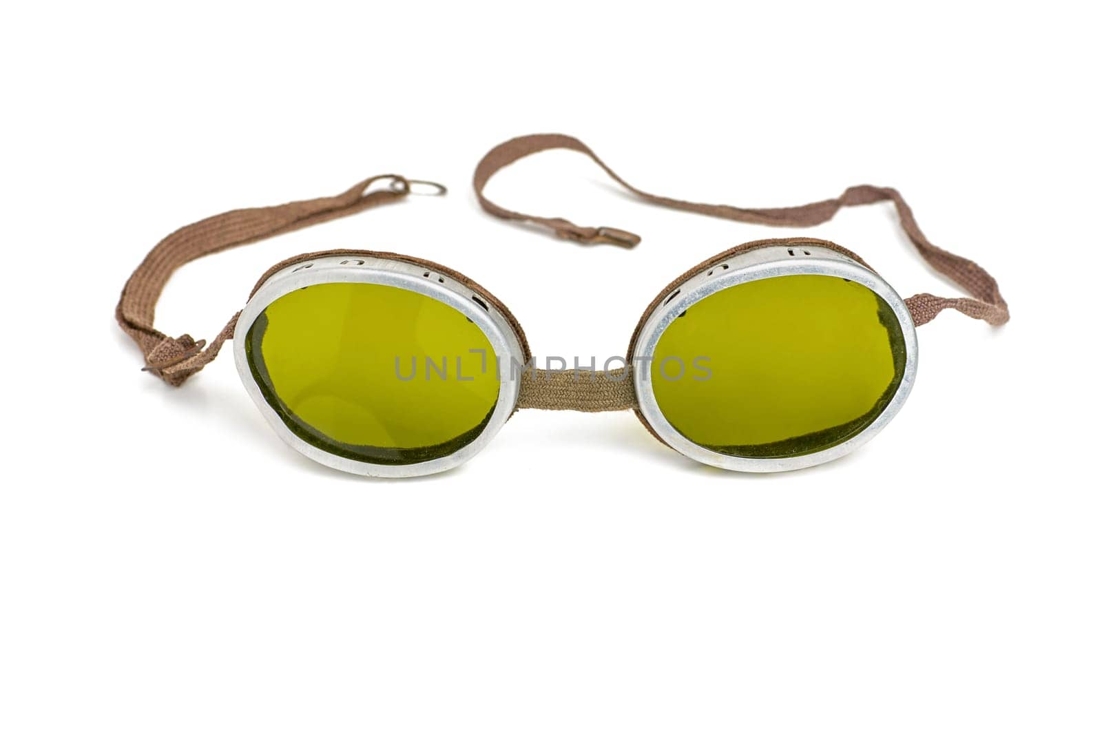 old safety goggles with green tinted lenses