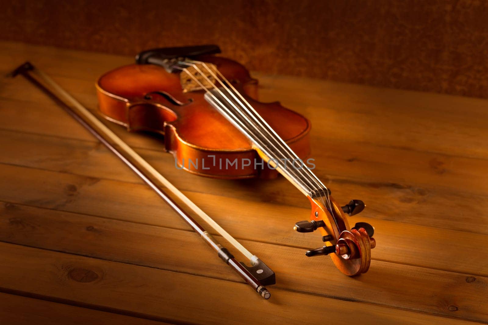 Classic music violin vintage in wooden golden background