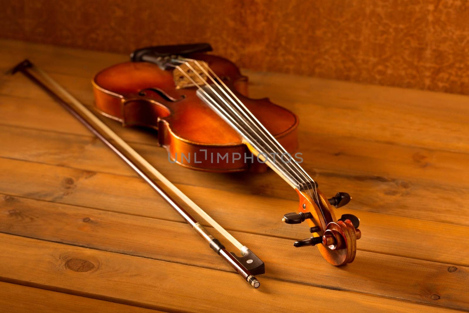 Classic music violin vintage in wooden golden background