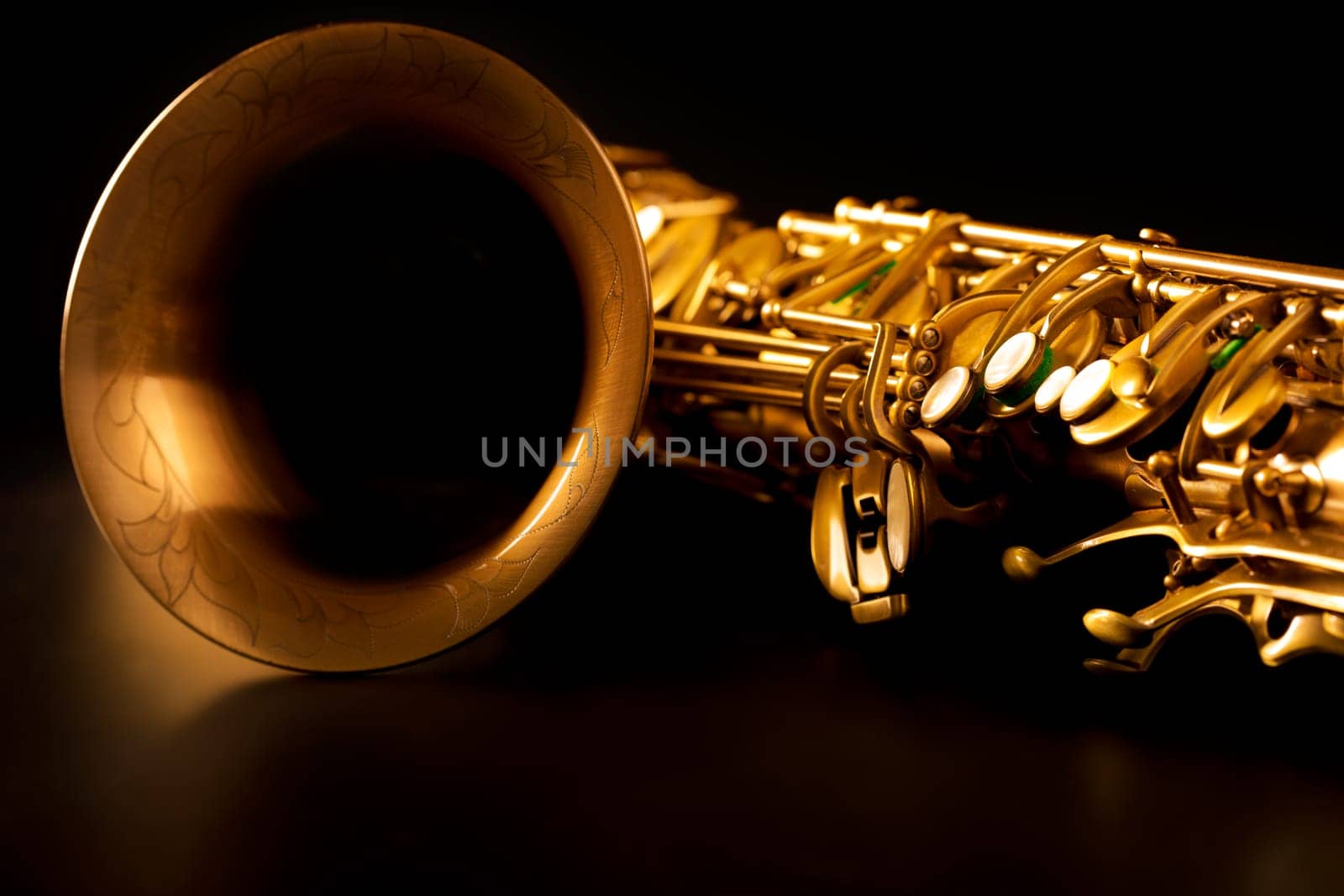 Tenor sax golden saxophone macro with selective focus on black