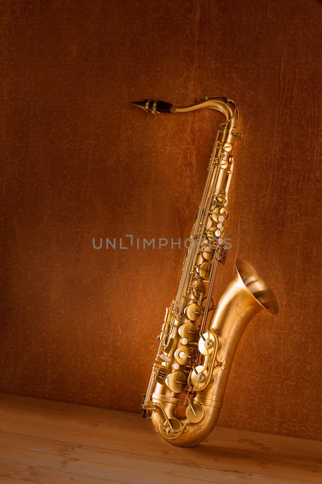 Sax golden tenor saxophone in vintage retro background