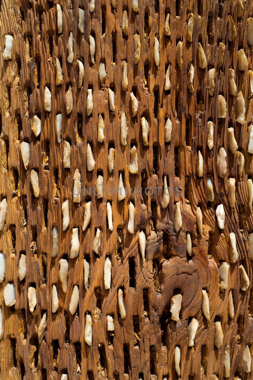 threshing board for wheat of aged wood and stones texture vintage pattern