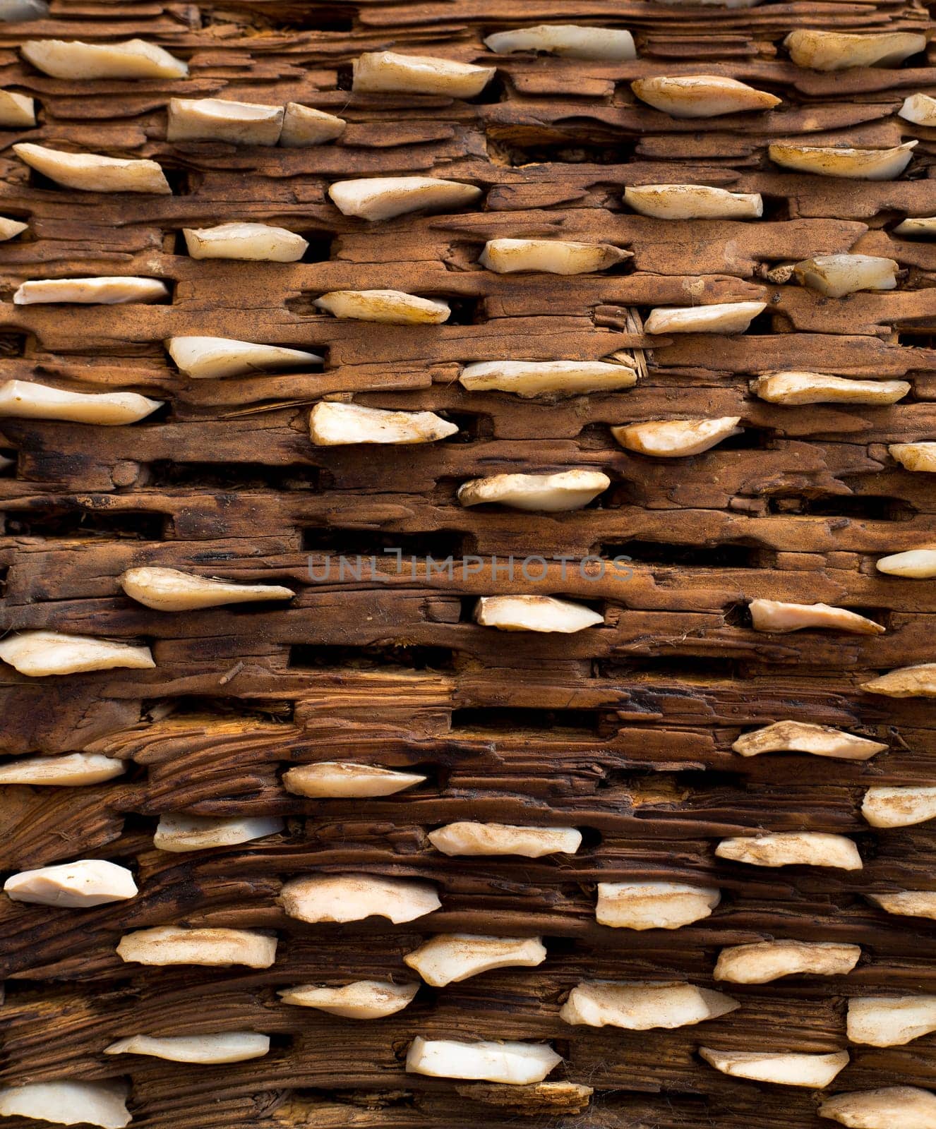 threshing board for wheat of aged wood and stones texture vintage pattern