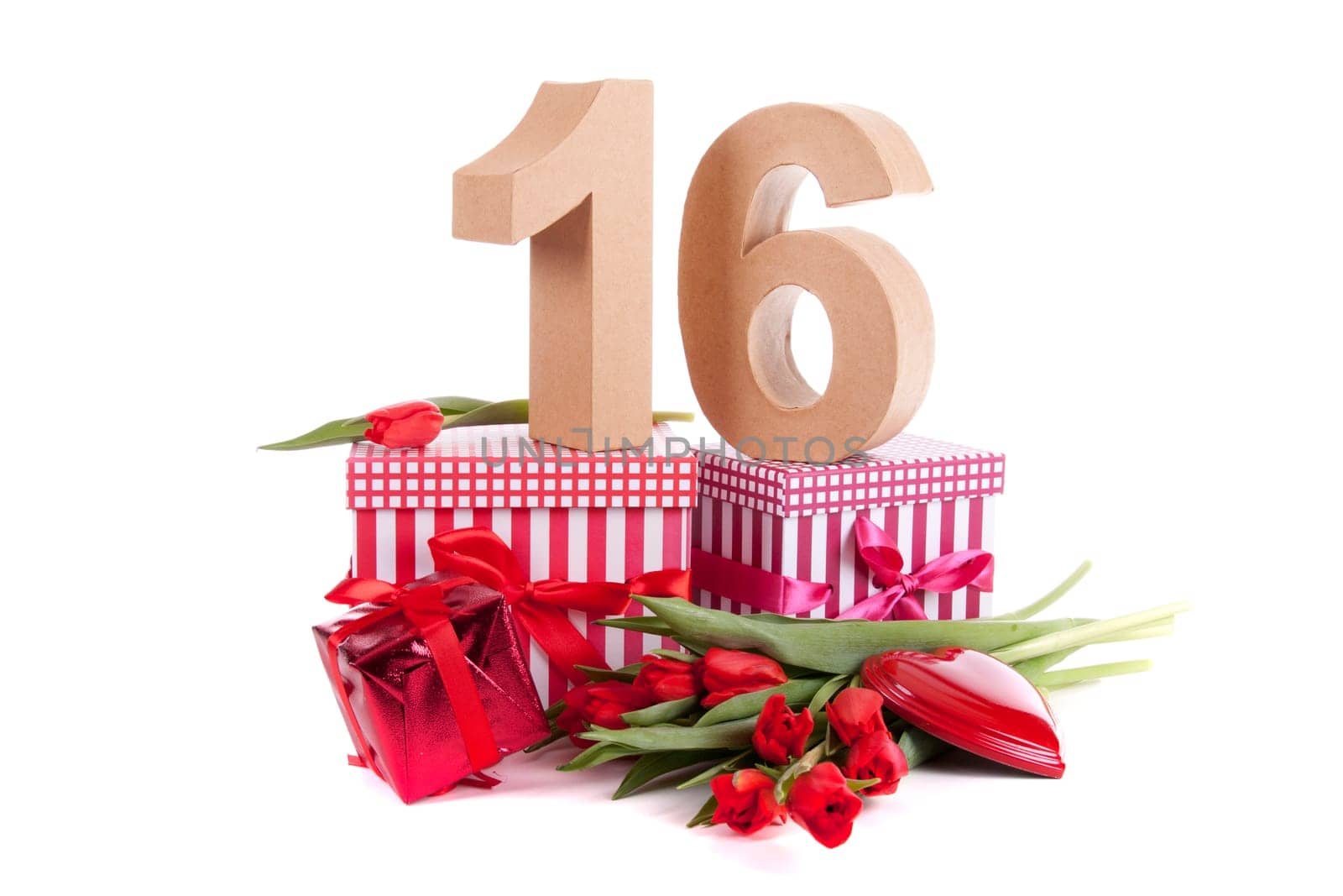 Number of age in a colorful studio setting with a red heart and gifts and tulips