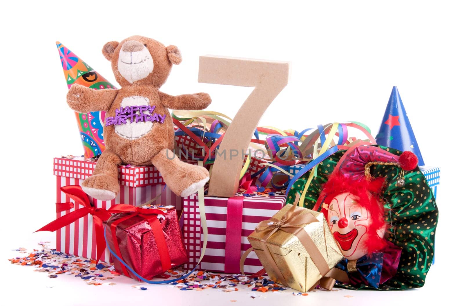 Number of age in a colorful studio setting with a red heart and gifts and tulips