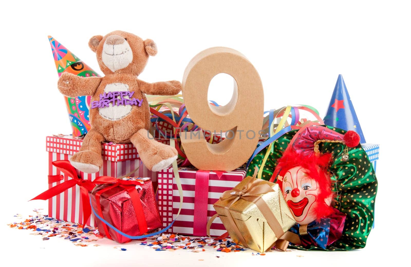 Number of age in a colorful studio setting with a red heart and gifts and tulips