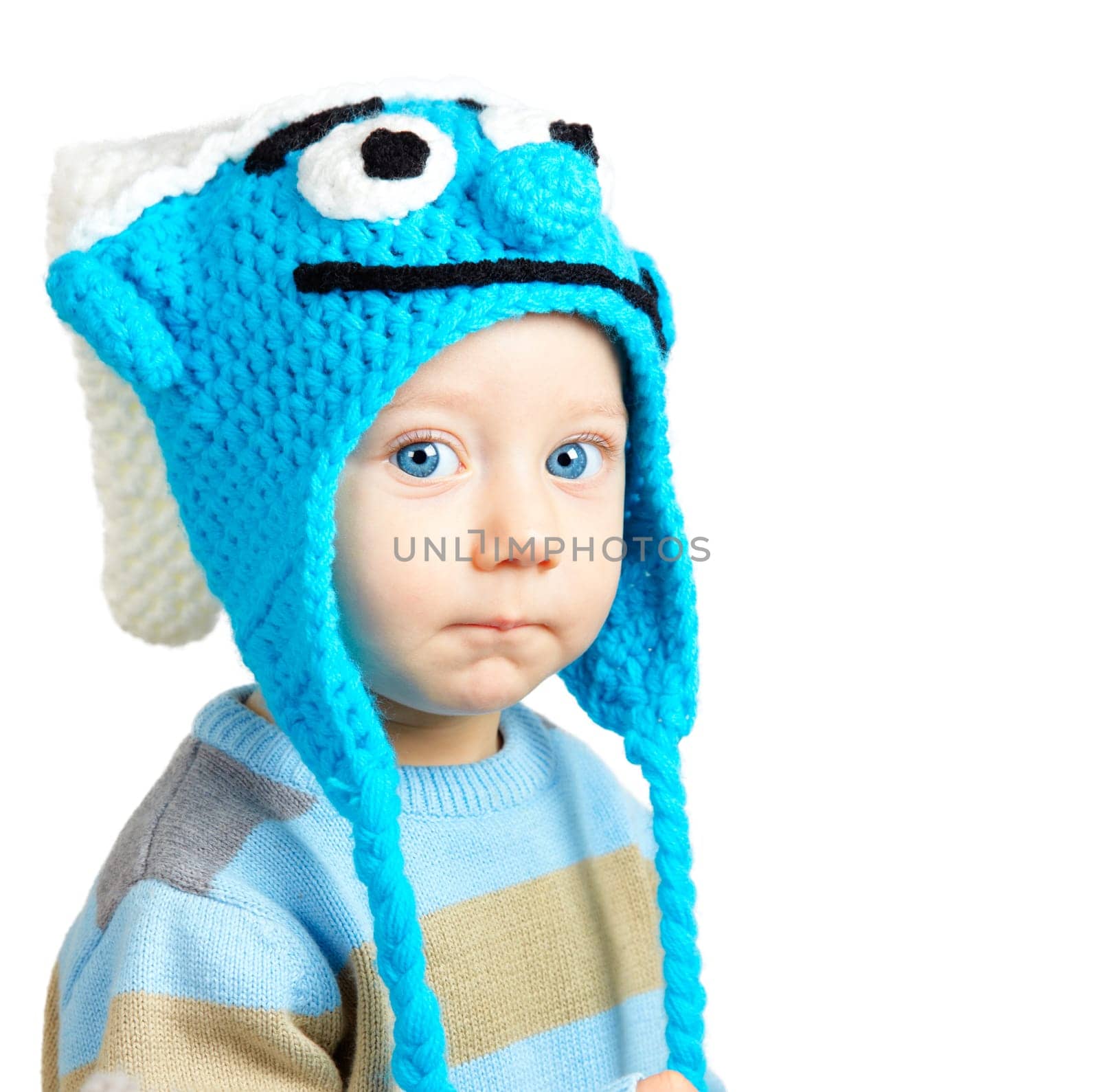 Closeup portrait of a sweet little adorable child over white background