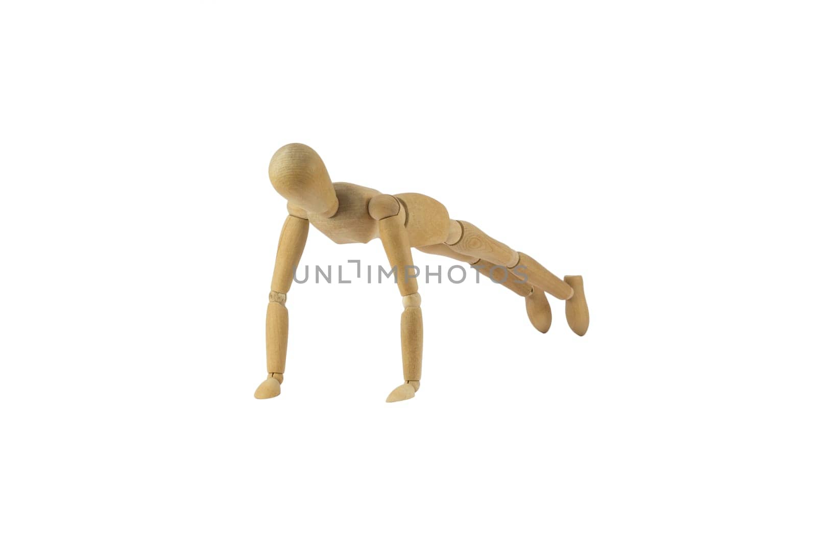 Wooden female figure is doing pushups