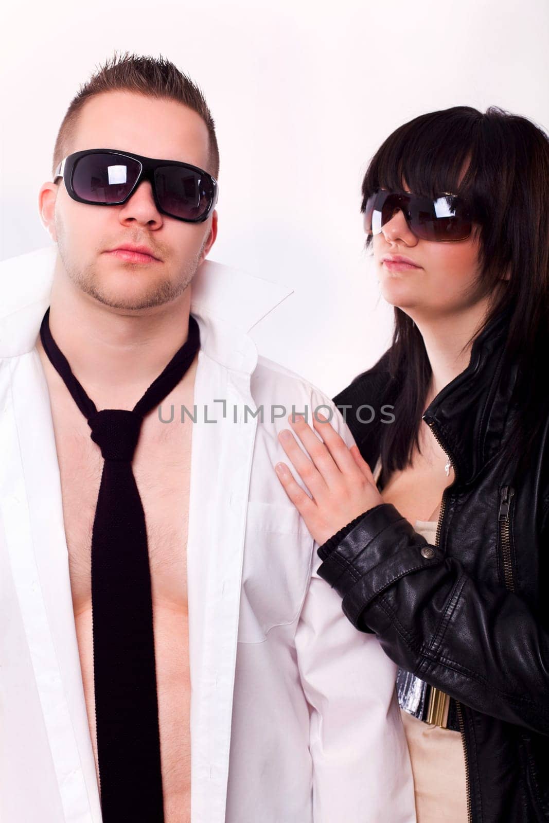 Young modern couple with sunglasses