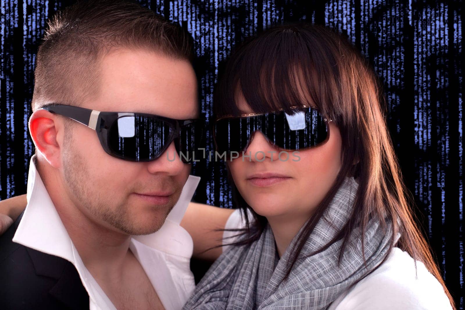 Young modern couple with sunglasses