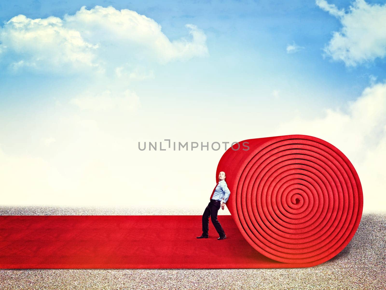 man roll huge red carpet