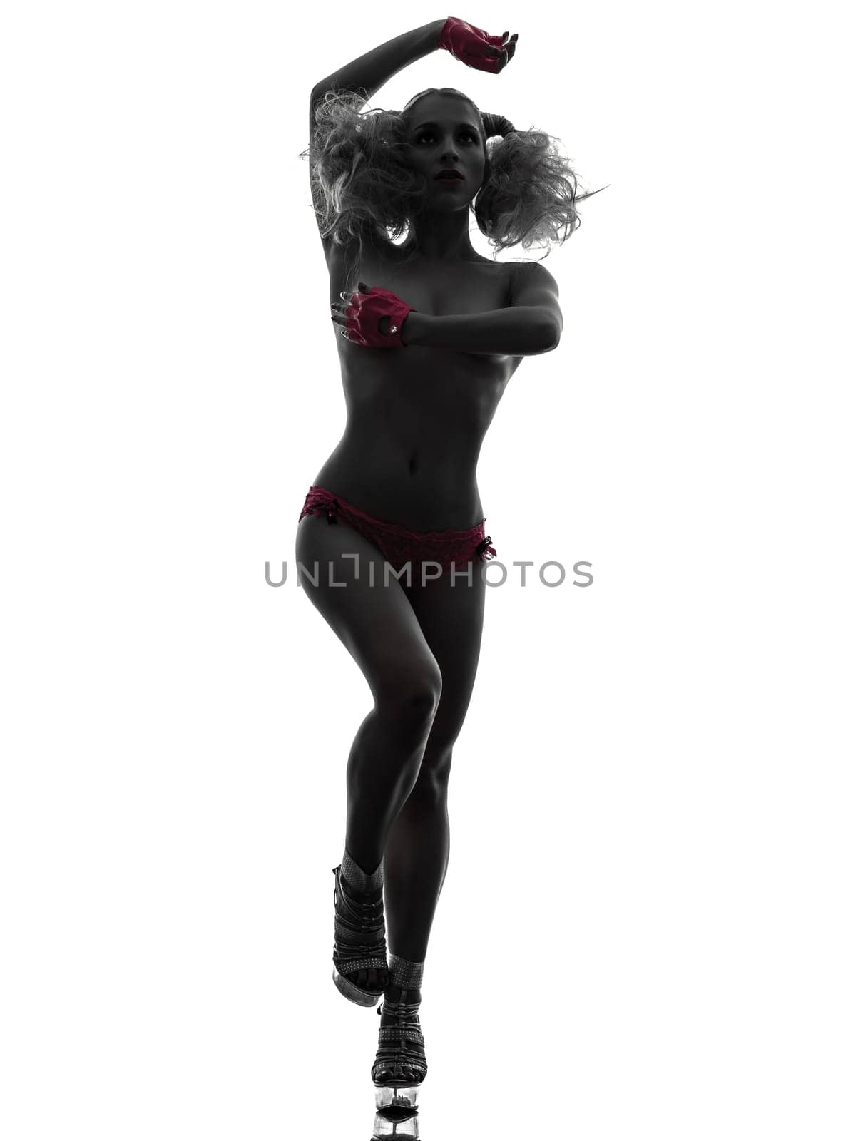one caucasian sexy woman topless with pink underwear in silhouette studio isolated on white background