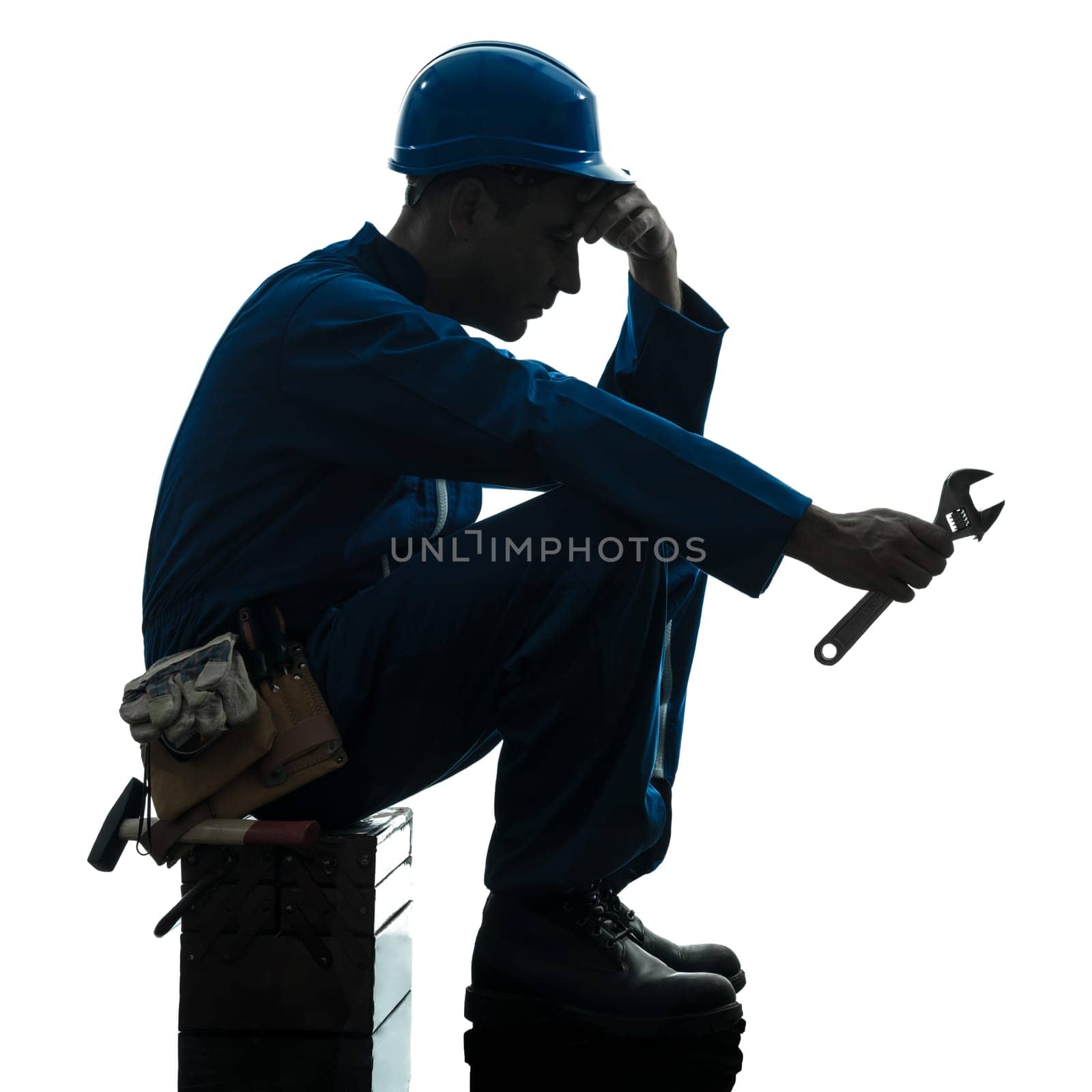 one caucasian repairman worker sad fatigue failure  silhouette in studio on white background