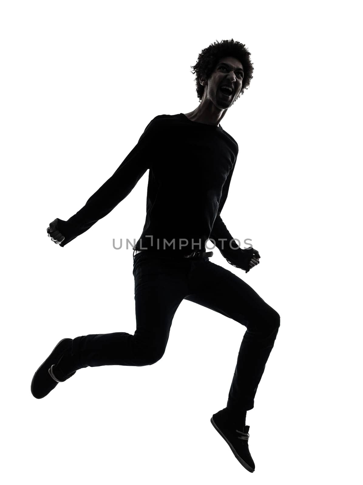 one african handsome young man jumping screaming  in silhouette studio isolated on white background