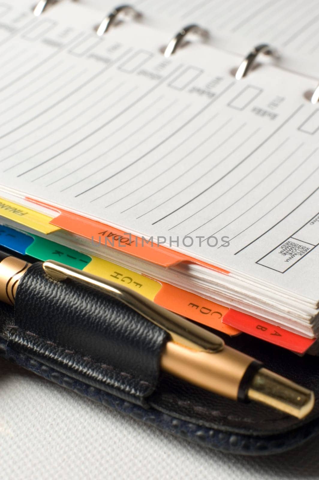 note book with pencil close up shoot