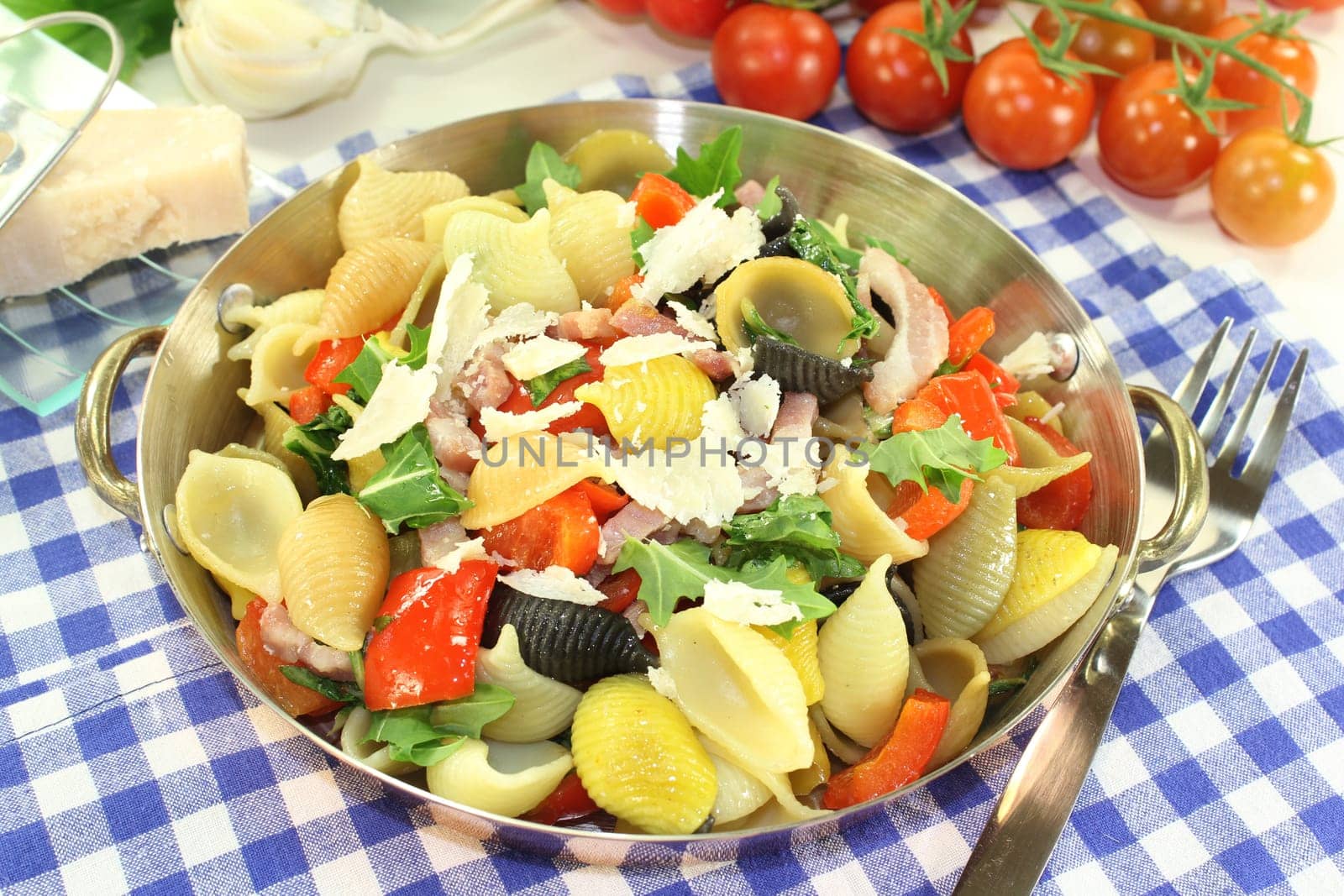 a pasta pan with vegetables and ham strips