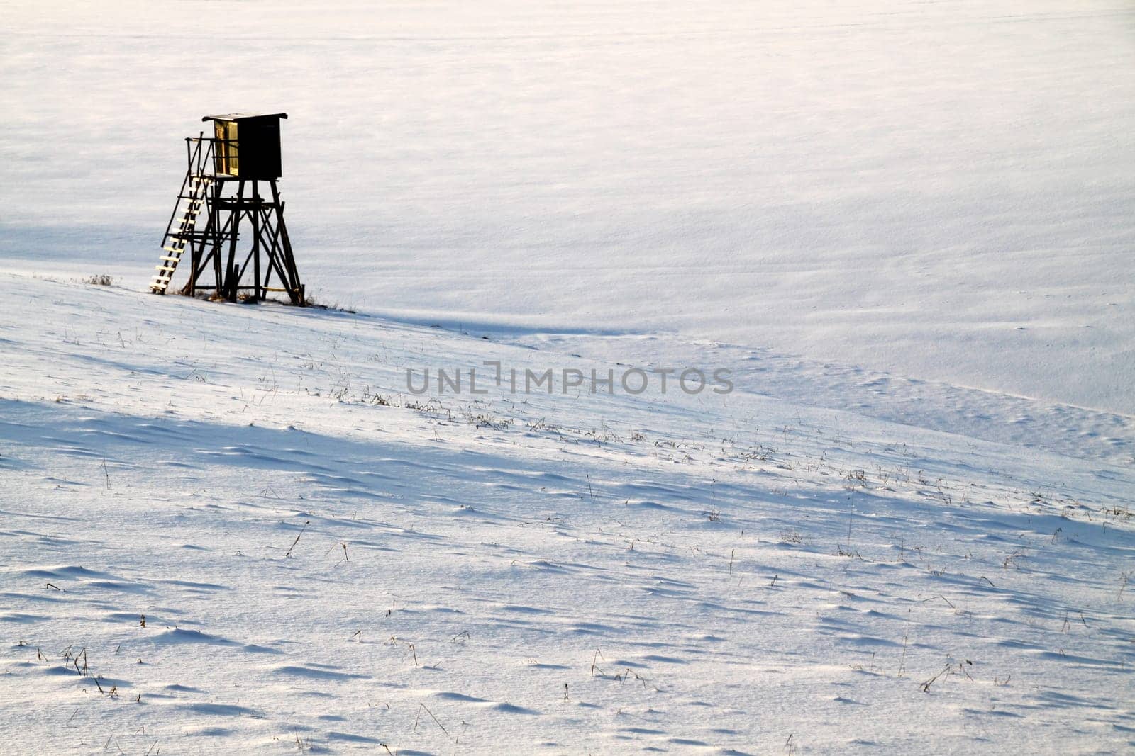 Winter landscape with high seat