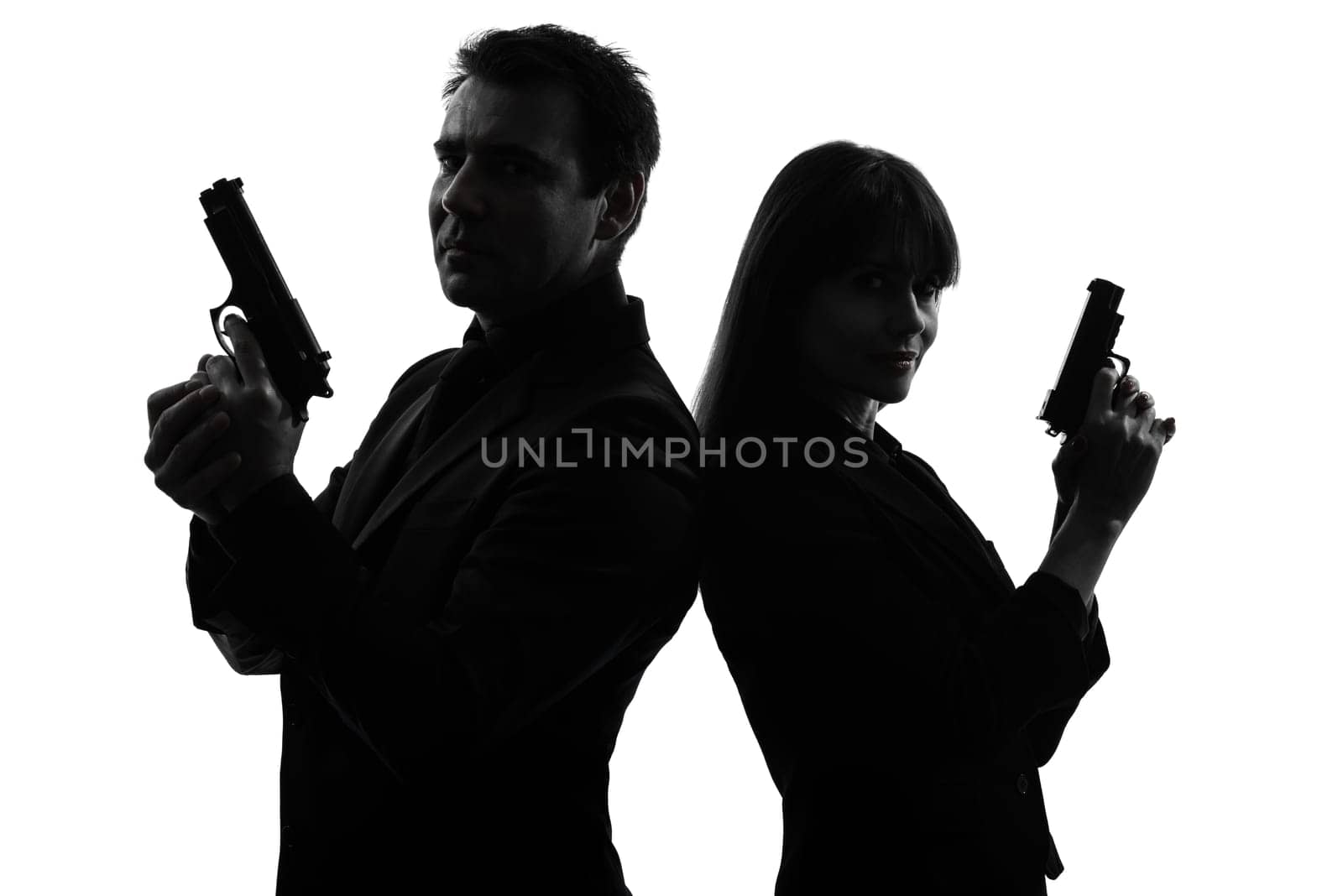 one caucasian man detective secret agent criminal  with gun  in silhouette studio isolated on white background