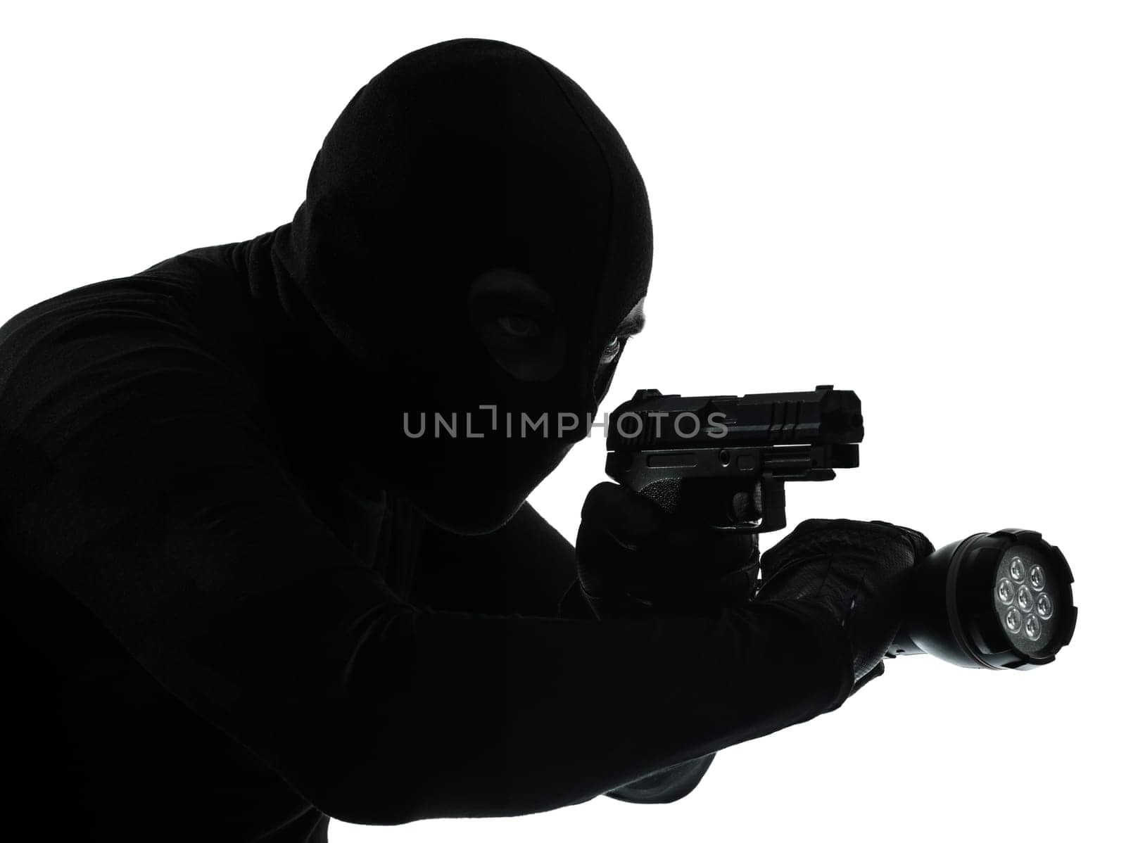 thief criminal terrorist in silhouette studio isolated on white background