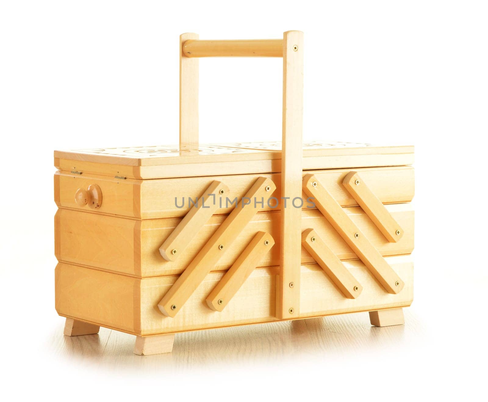 Wooden box for needles and threads isolated on white background