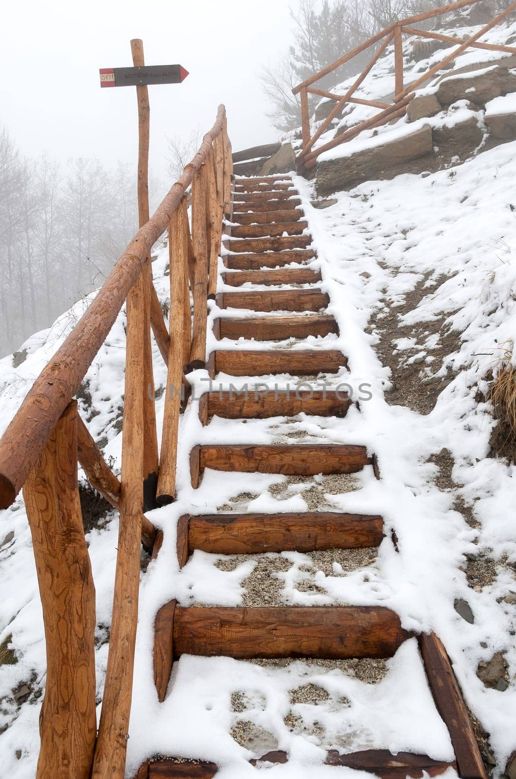 stairs with snow in winter in emilia Romagna Apennines