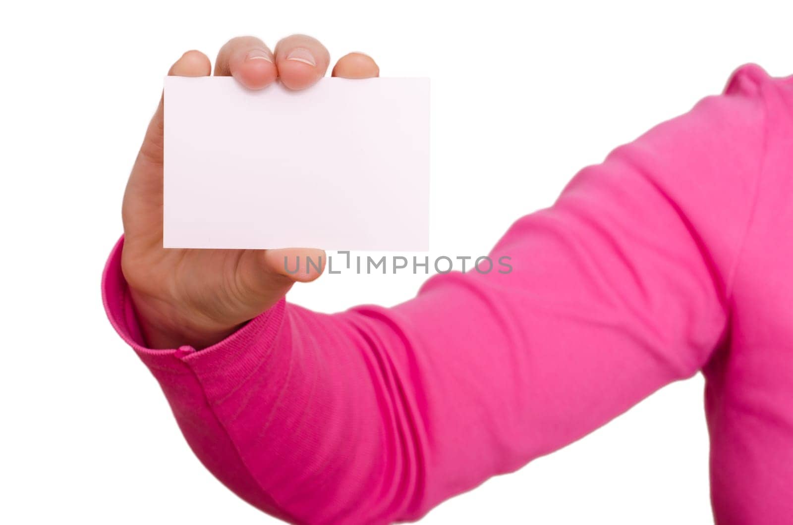 Female hand with magenta sweater holding a blank business card