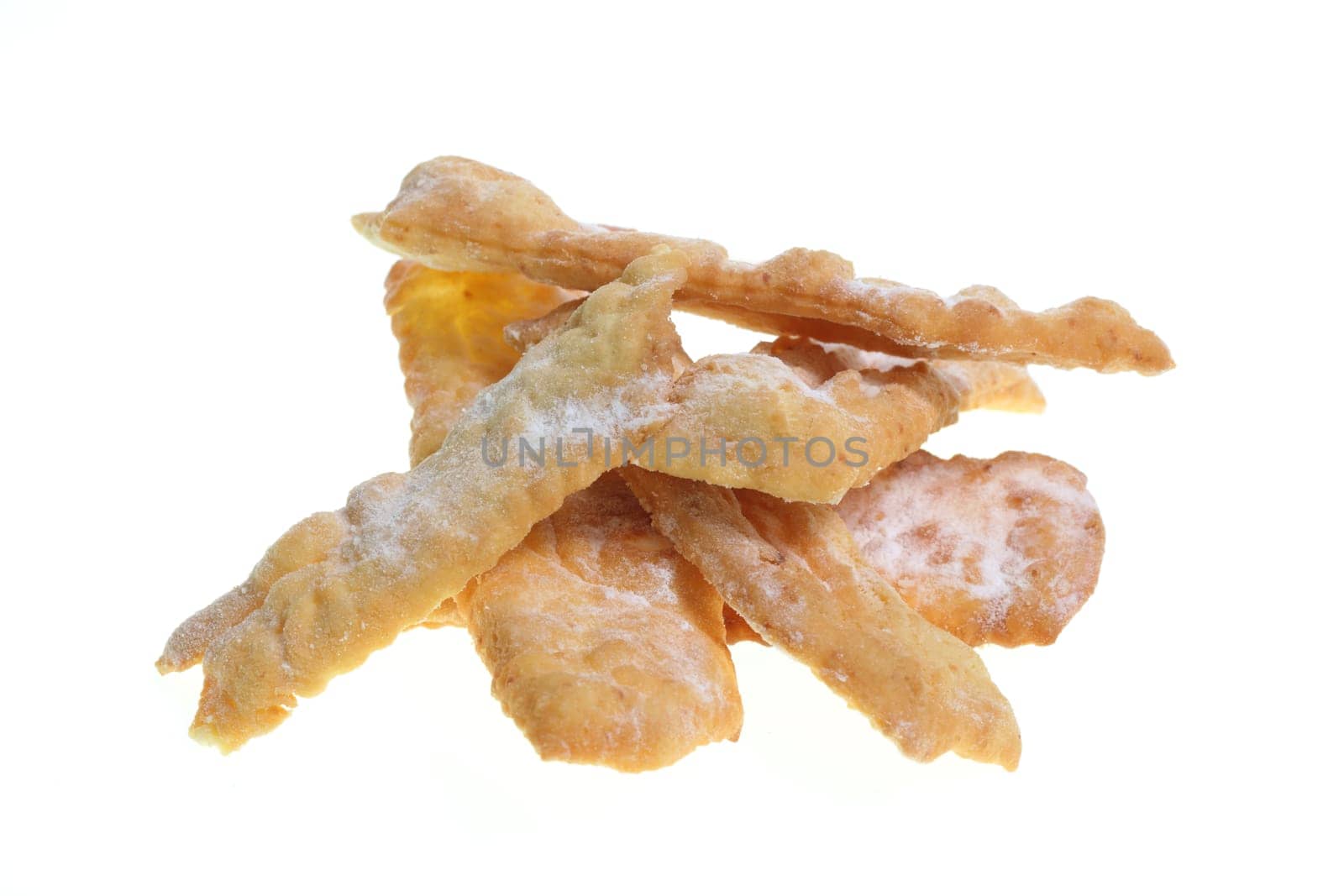 Details of "Angel wings"" or ""bugnes"" are a french traditional sweet crispy pastry made out of dough that has been deep-fried and sprinkled with powdered sugar."
