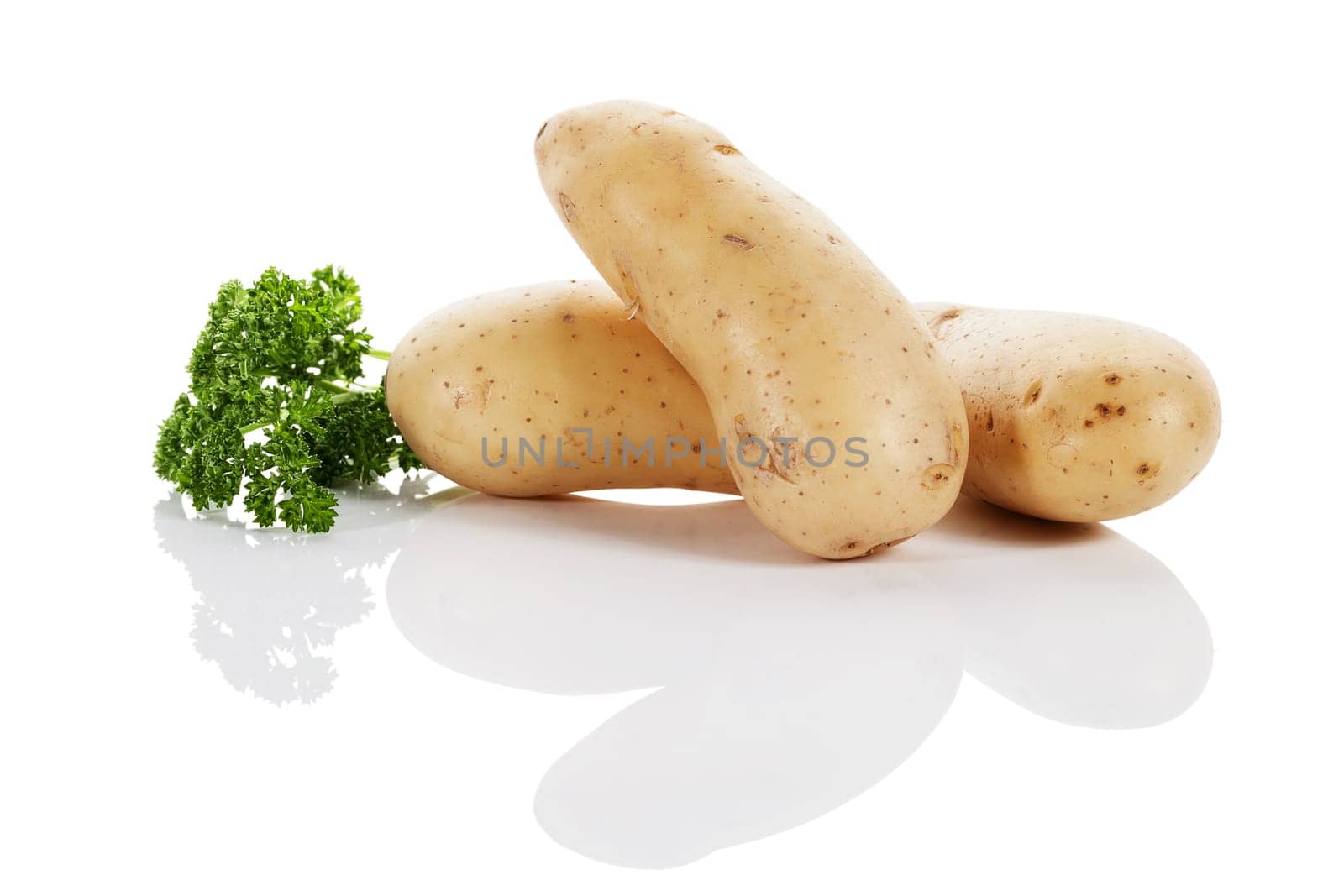 Potatoes with parsley on white background