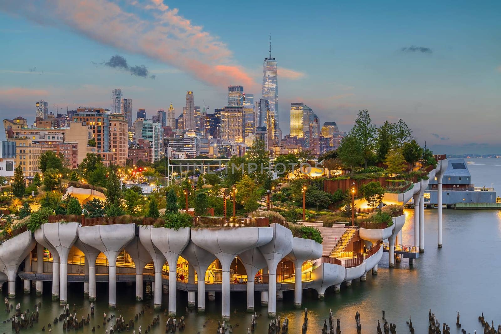 Cityscape of downtown Manhattan skyline with the Little Island Public Park in New York City at sunrise