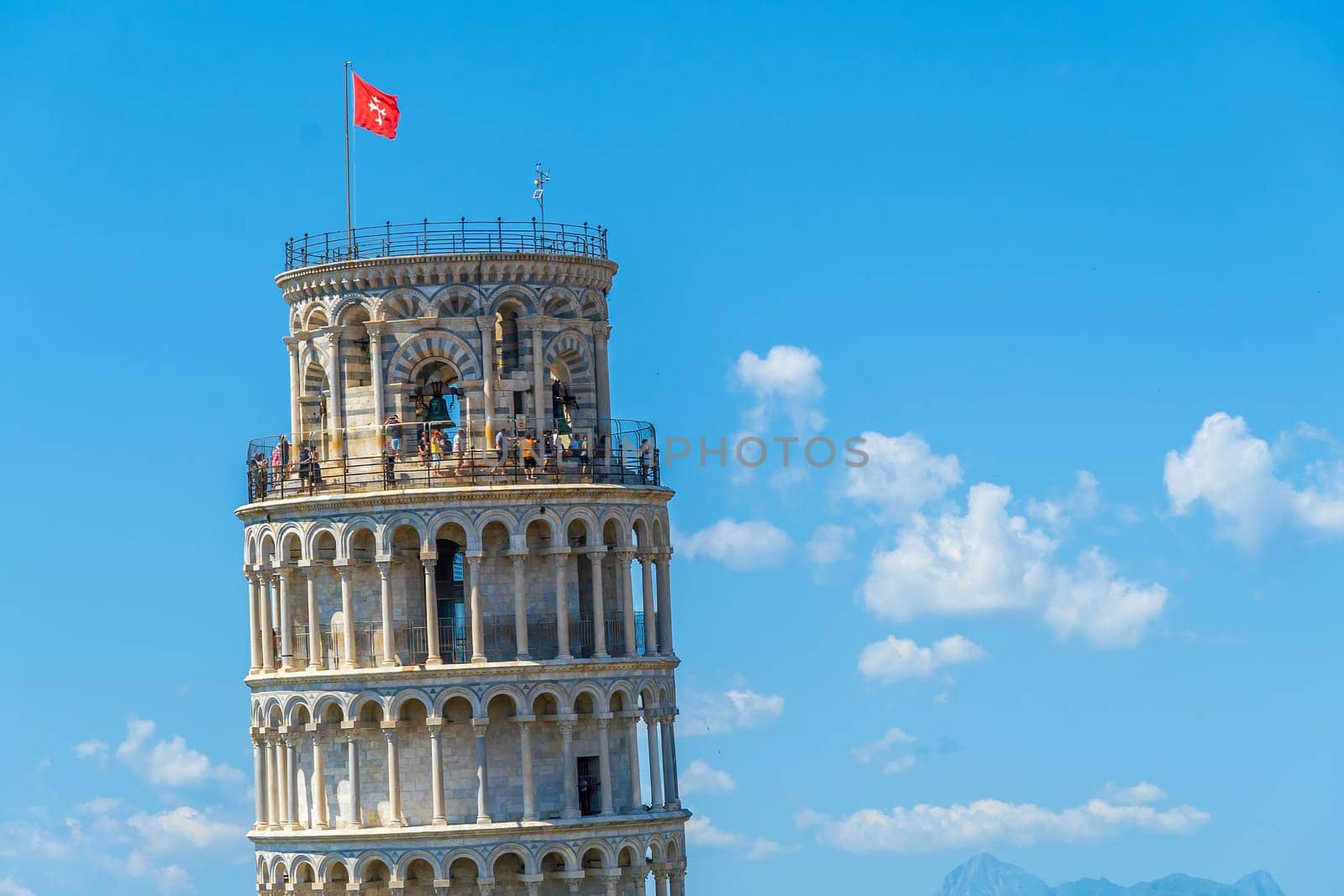 The famous Leaning Tower in Pisa, Italy with beautiful blue sky