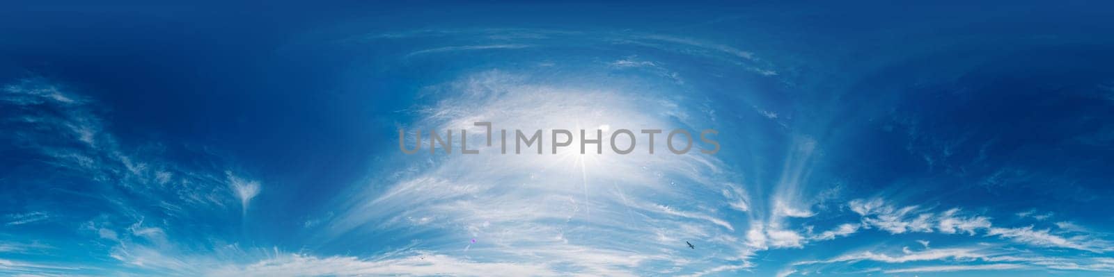 Bright sunset sky panorama with Cirrus clouds. Seamless hdr spherical equirectangular 360 panorama. Sky dome or zenith for 3D visualization, game and sky replacement for aerial drone 360 panoramas.