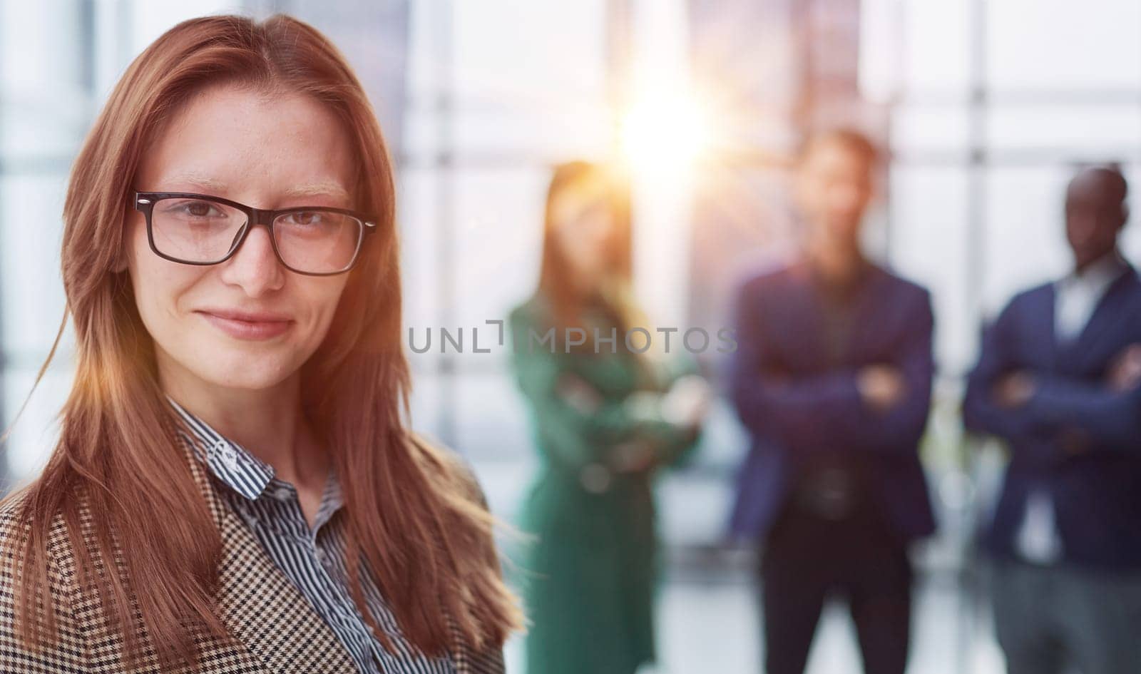 woman holding paper folder with resume in office. by Prosto