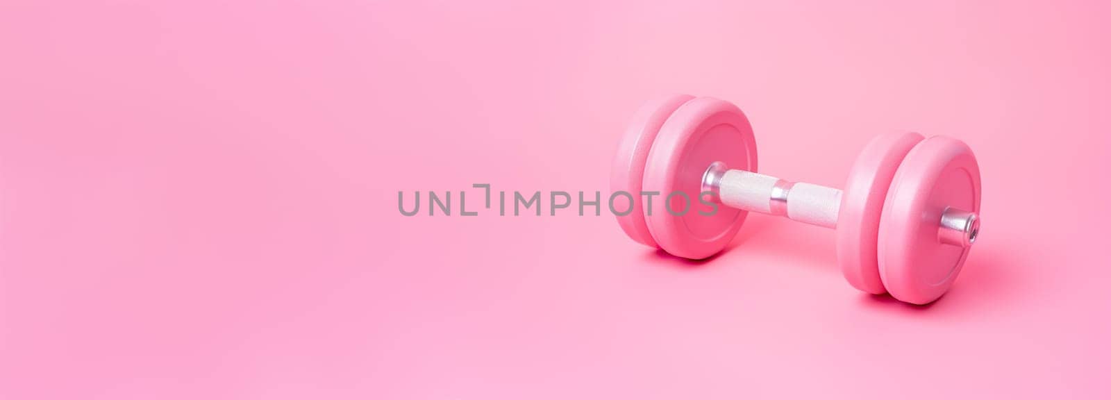 Dumbbell on pink background. Gym, fitness club for women concept. Close-up view. Be active, sporty. Healthy lifestyle. Loss weight and stay motivated. Empty, copy space for text. Generative AI