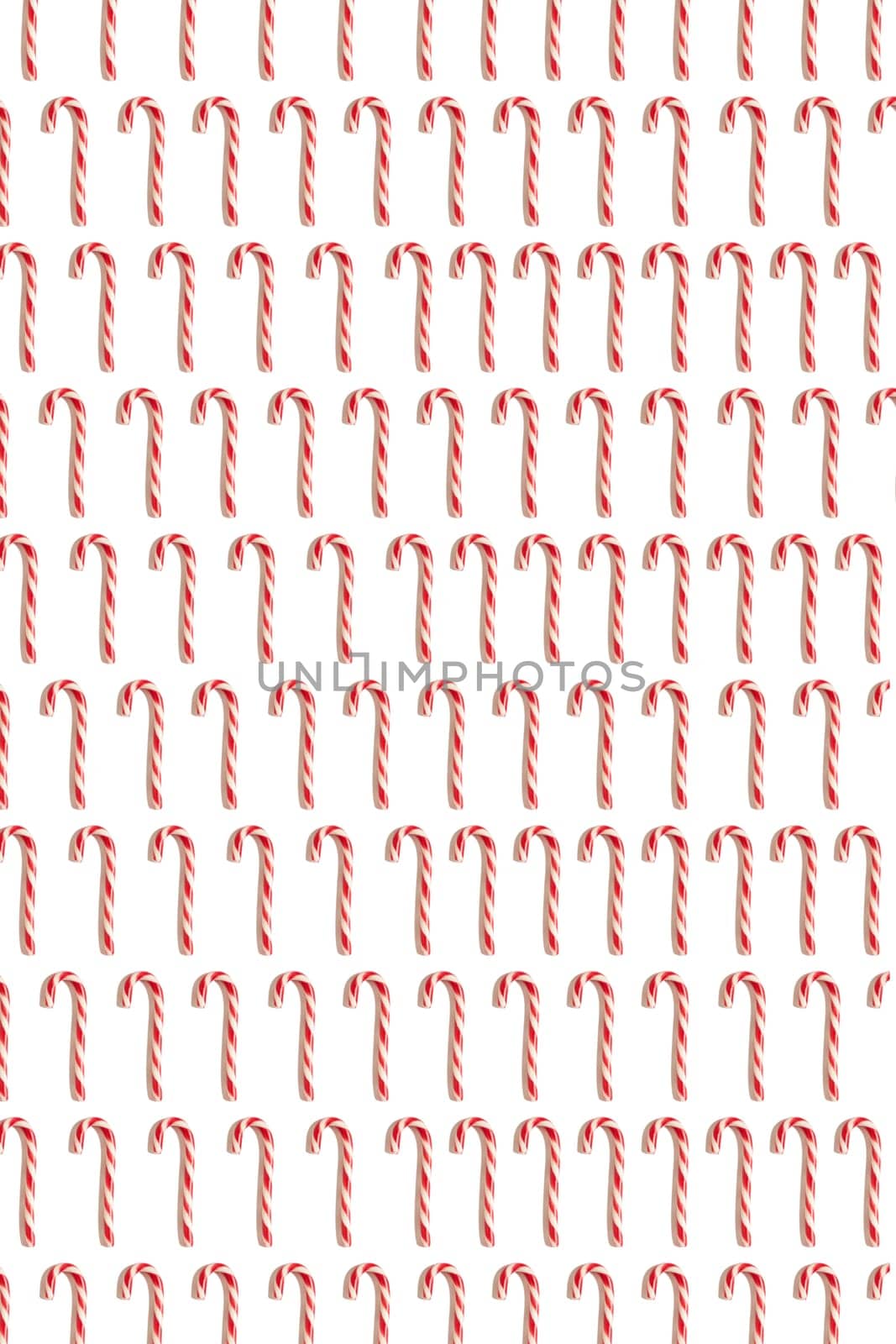 Christmas greeting card. White background. New year symbol. Christmas candy cone. Pattern