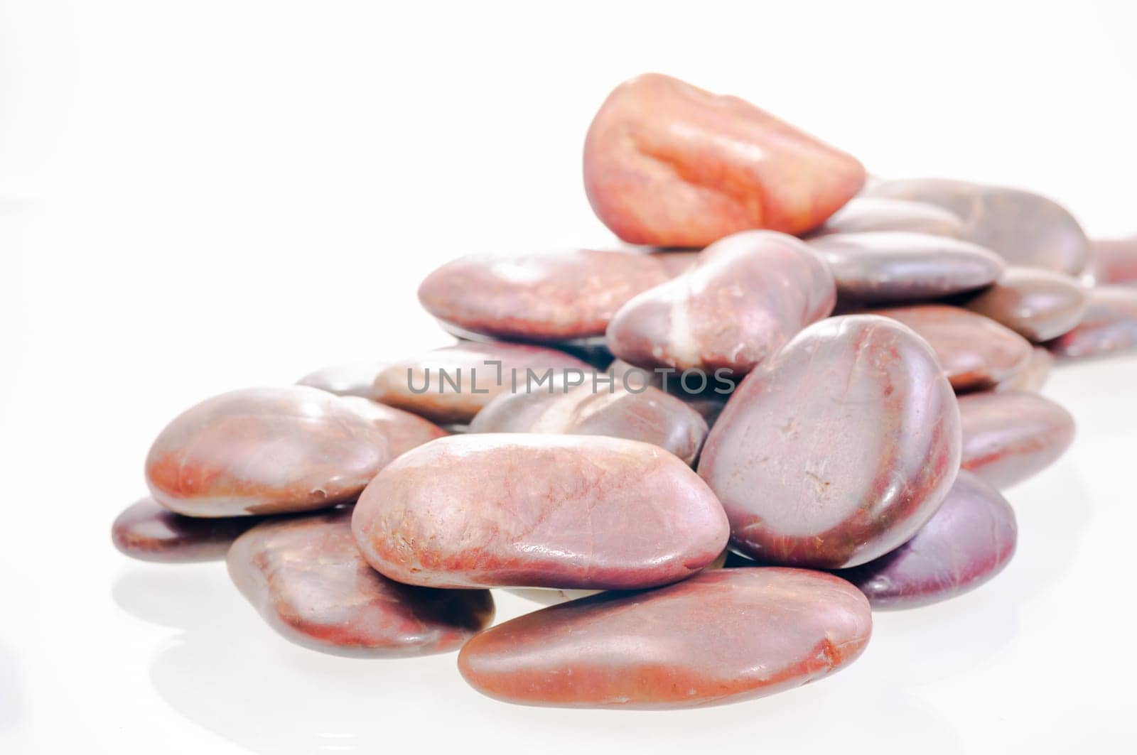 A heap of red river zen stones close up