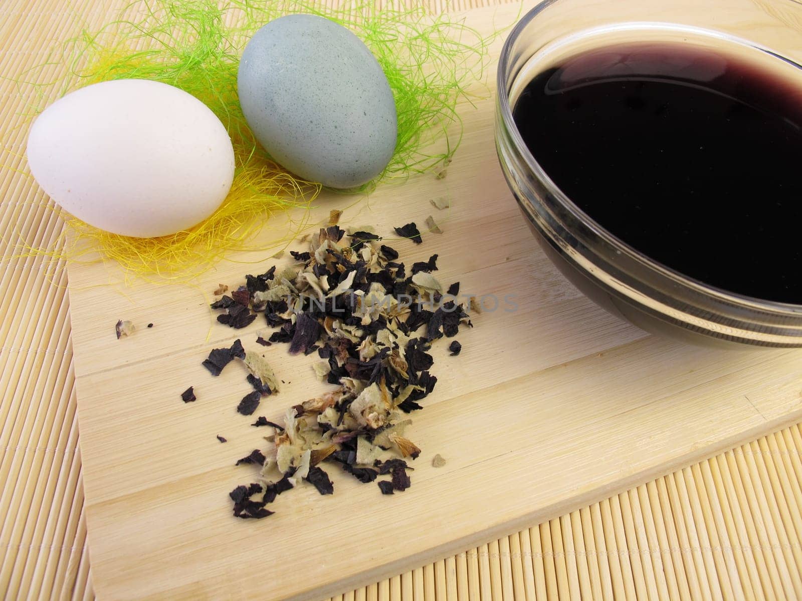 Dyeing Easter eggs with plant dye from hollyhock flowers