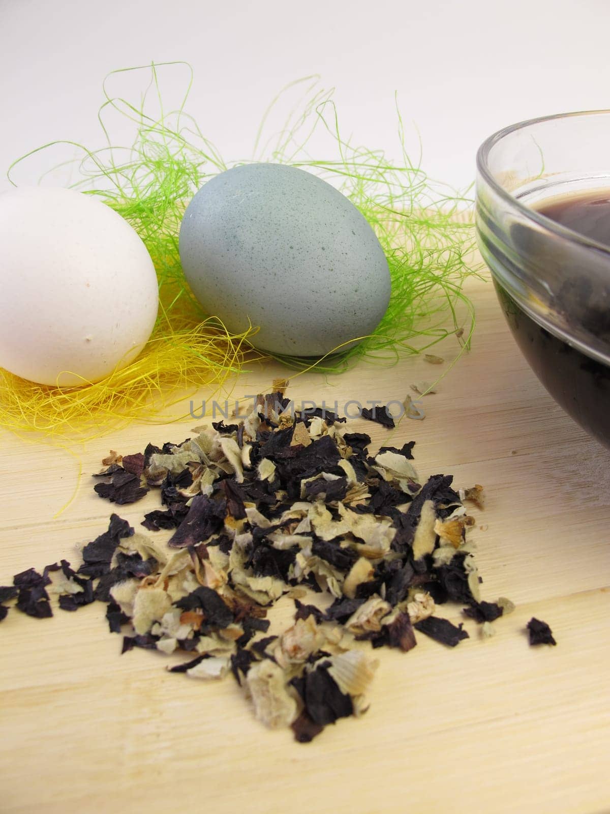 Dyeing Easter eggs with plant dye from hollyhock flowers