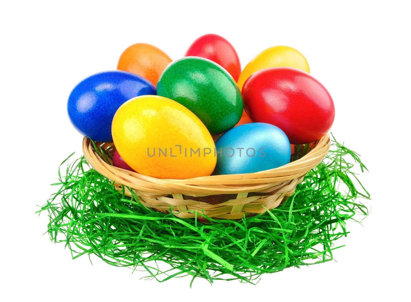Easter eggs in basket on easter grass,isolated on white background