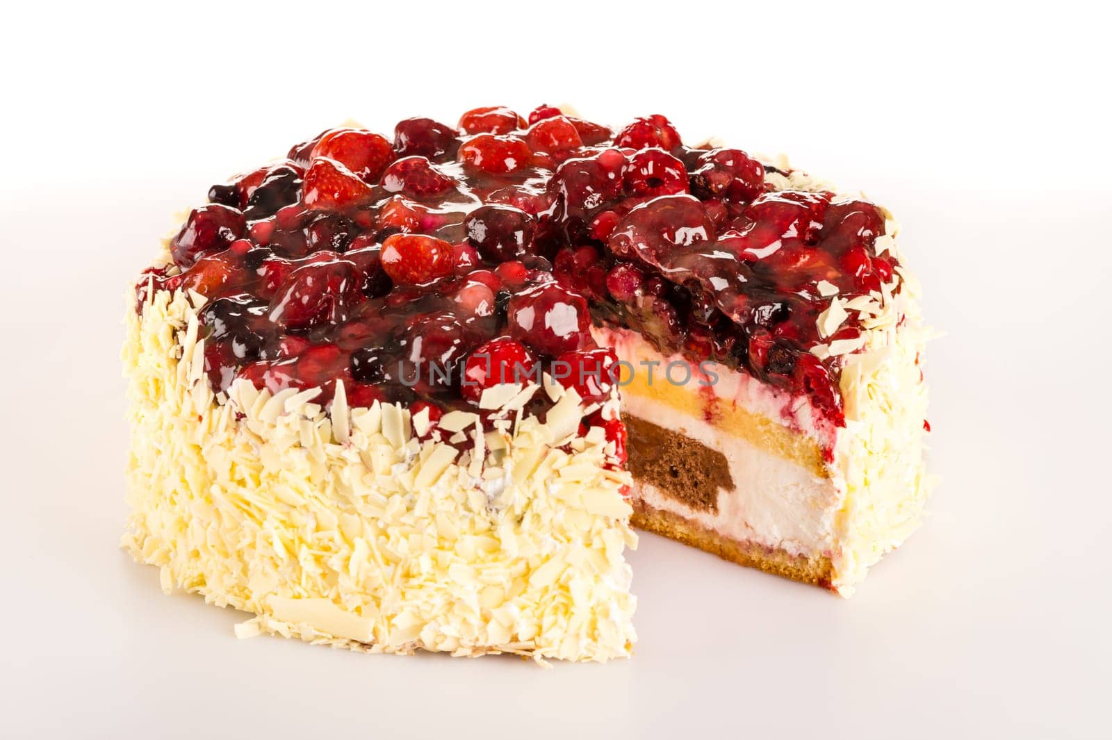 Dessert curd light creamy cake with red berries almonds