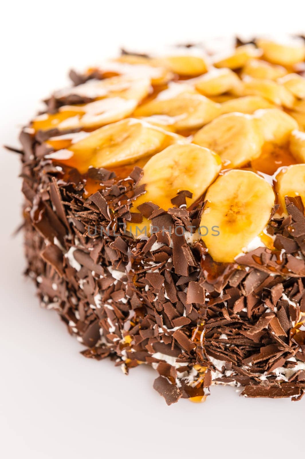 Banana dessert cake with dark chocolate topping sweet treat