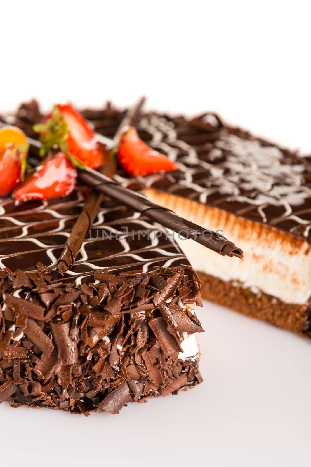 Dark chocolate cake creamy with strawberries cocoa topping