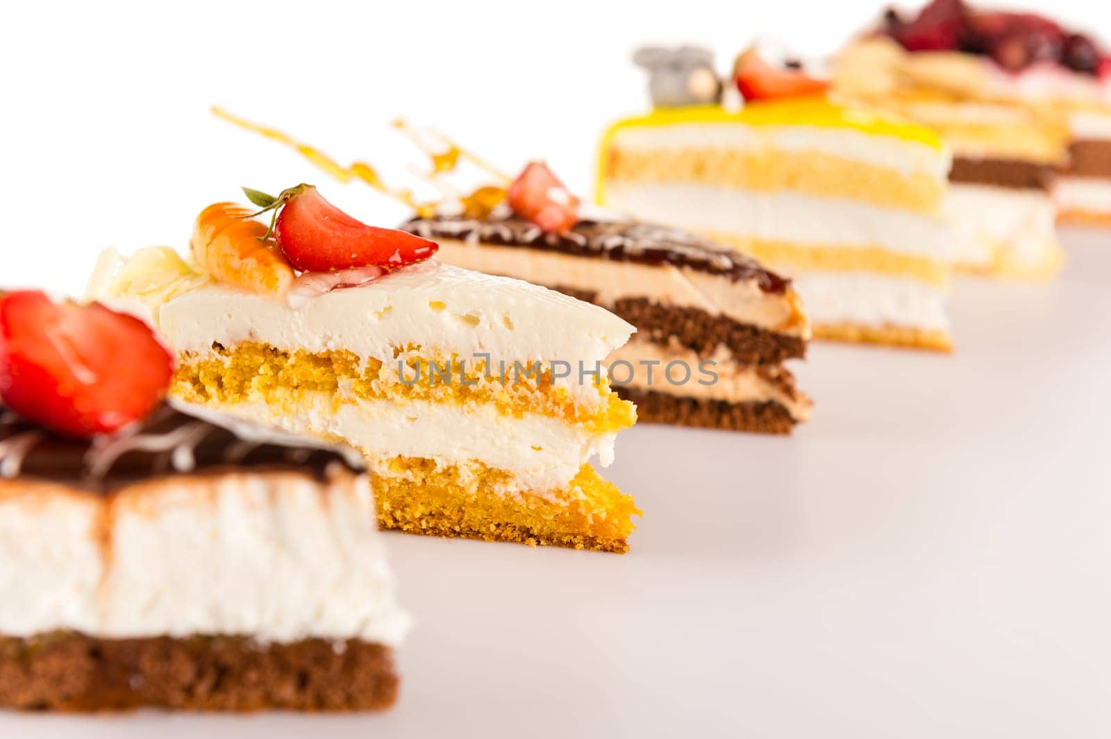 Cake selection close-up of tart slice dessert sweet treat