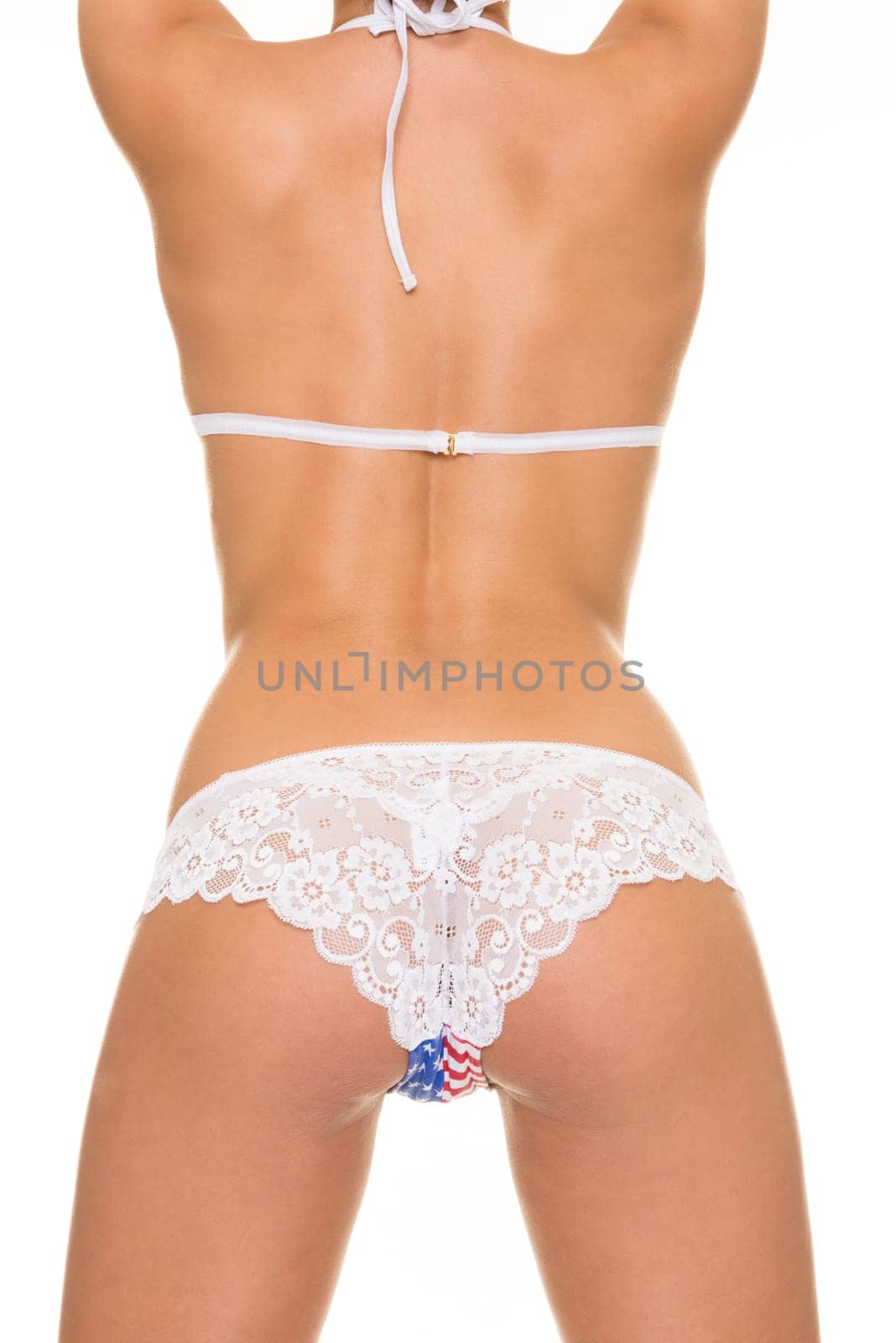 Young woman in underwear from behind