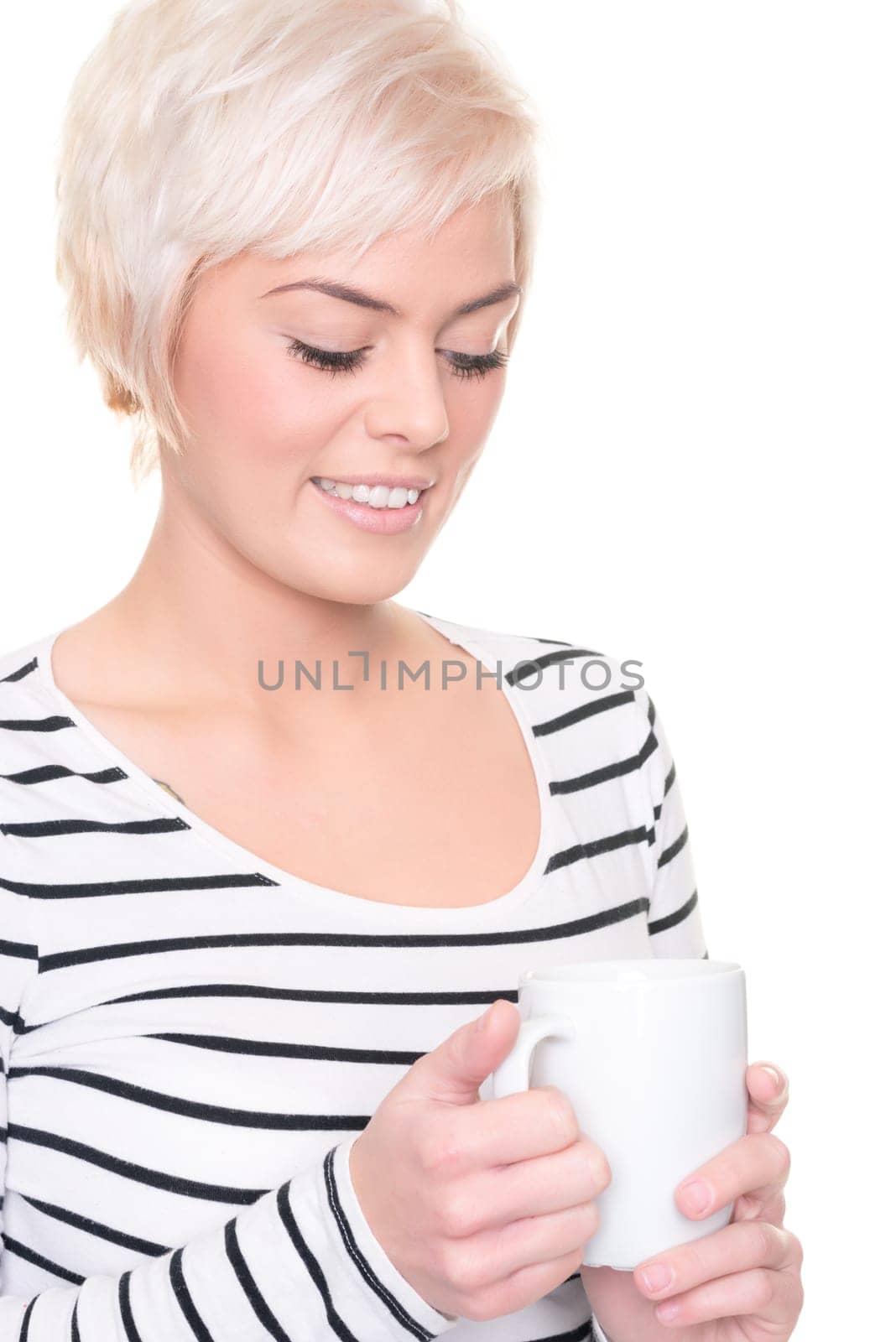 Young and happy woman in front of white background