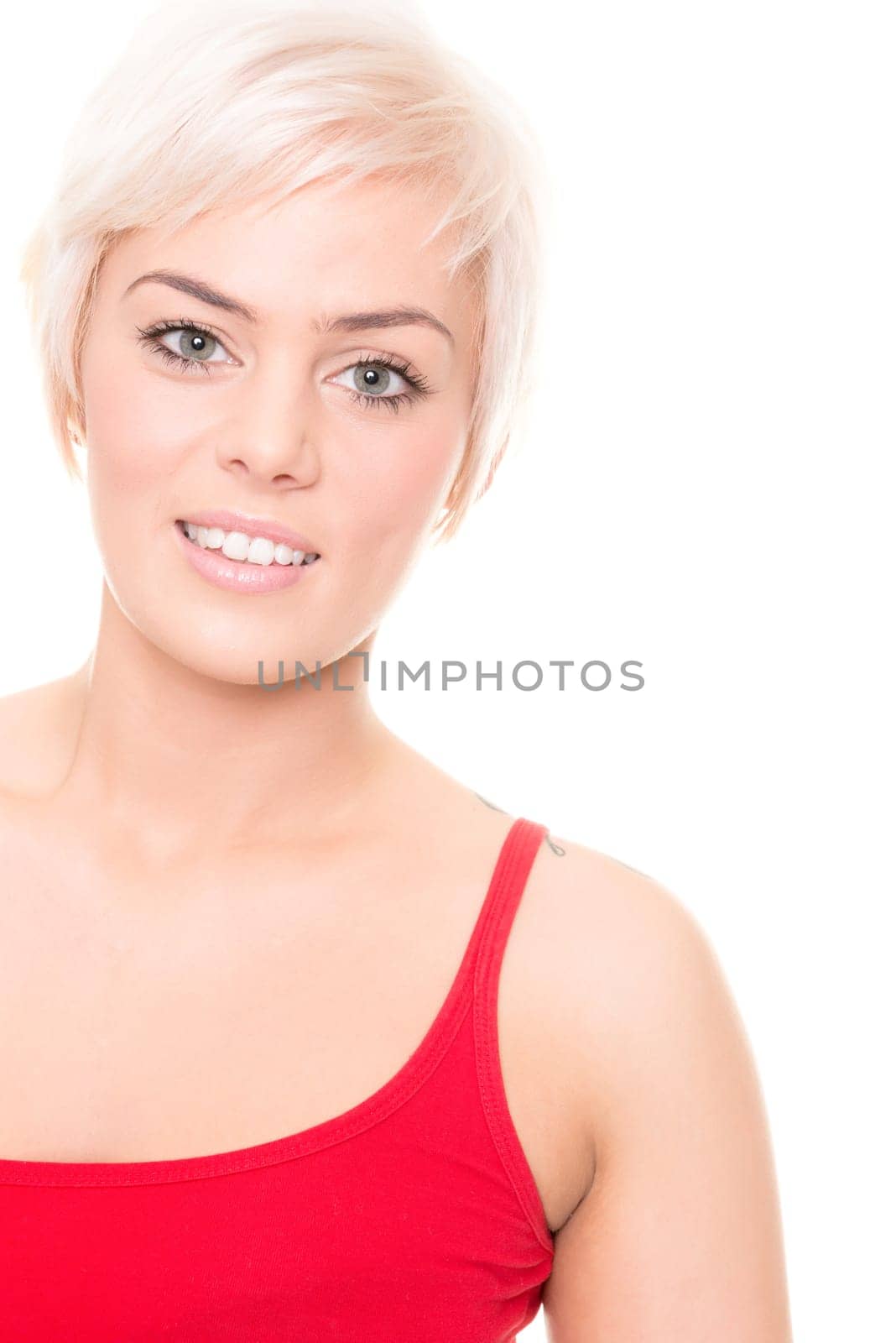 Young and happy woman in front of white background