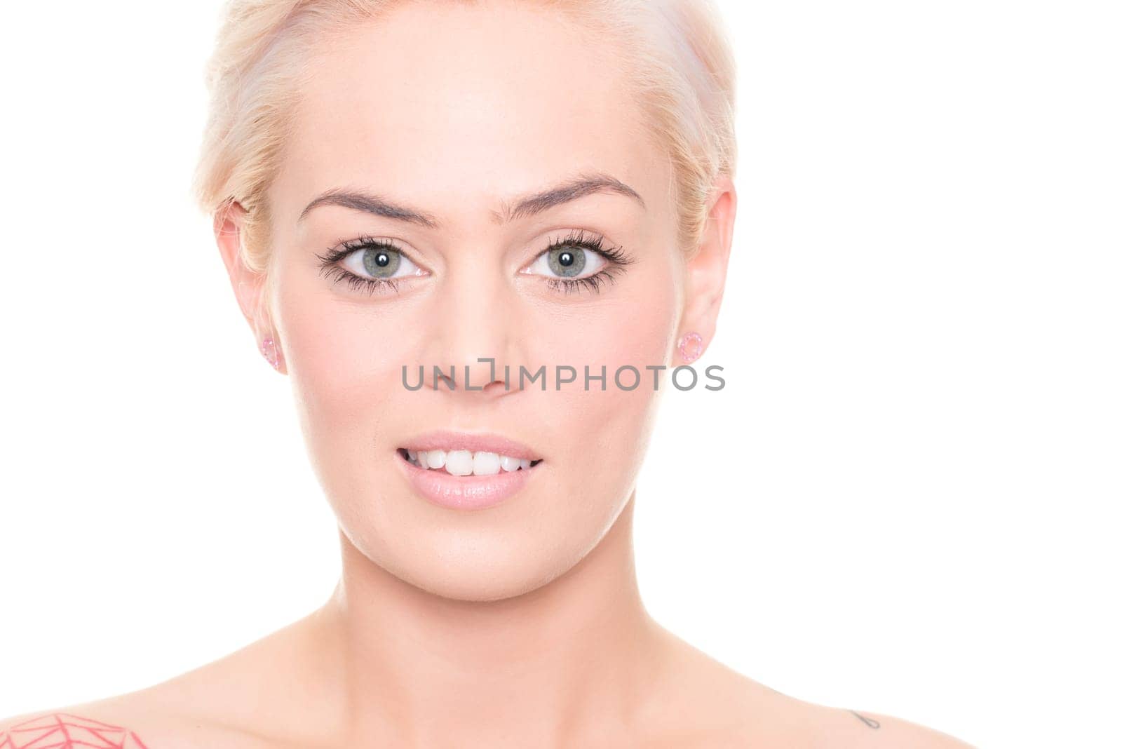 Young and happy woman in front of white background