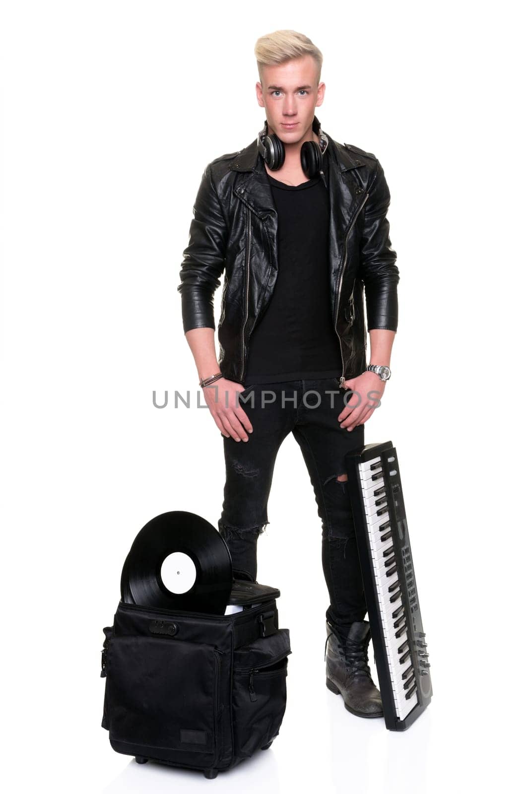 Full length shot of a disc jockey against a white background